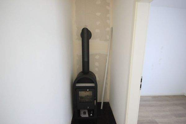 Kaminofen im Flur linke Wohnung