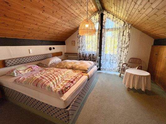 Schlafzimmer mit Balkon