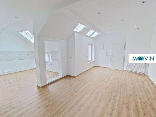 Ansicht II: Wohn- und Esszimmer mit offenem Küchenbereich