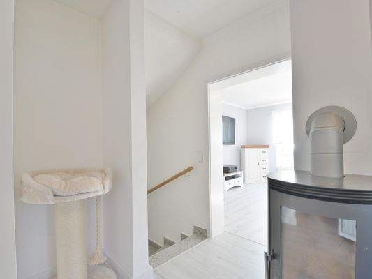 Treppenaufgang in den Wohn-Essbereich