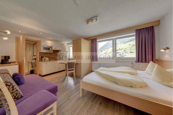 Apartmentzimmer mit Küche