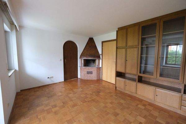 Wohnzimmer mit Kamin