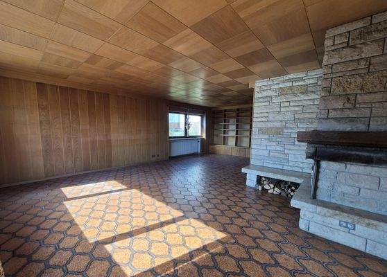 Wohnzimmer mit Kamin