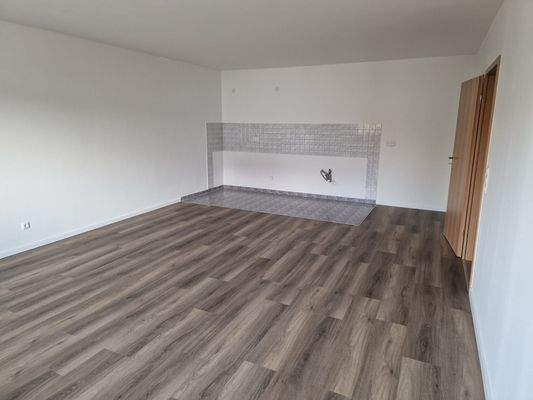 Wohnzimmer mit offener Küche.jpeg