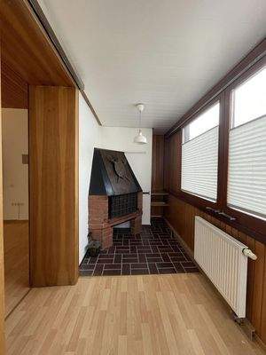 Wintergarten mit Kamin