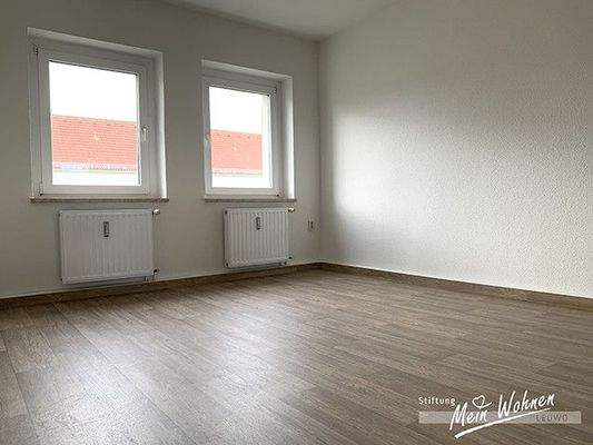 Wohnzimmer mit Balkon