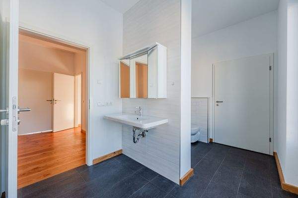 Bathroom with access to dressing room