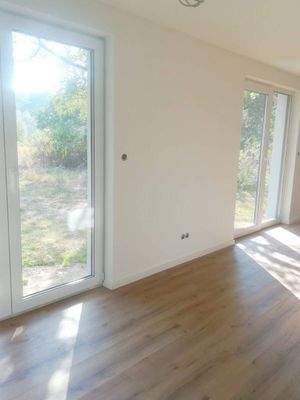 Bodentiefe Fensterelemente in offen gestaltetem EG