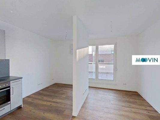 Ansicht I: Wohn- und Esszimmer mit offenem Küchenbereich