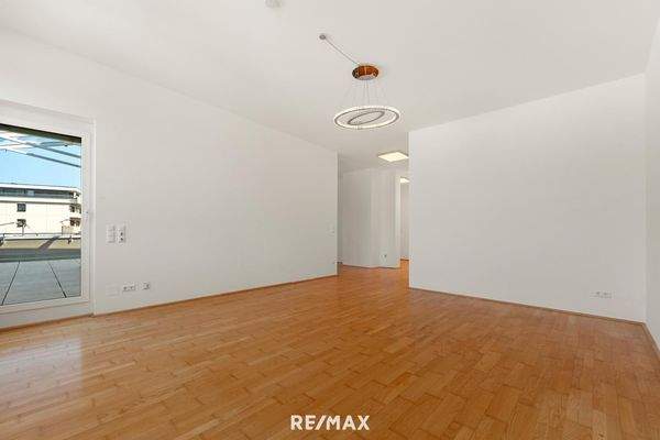 Wohnzimmer samt Zugang Terrasse