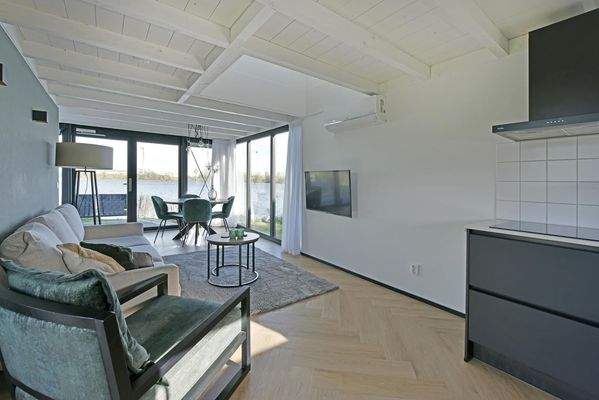 Luxus 4-Personen-Ferienhaus direkt am Wasser im Roompot Lakeside Resort Brielle mit 2 Schlafzimmern und 2 ensuite Badezimmern028