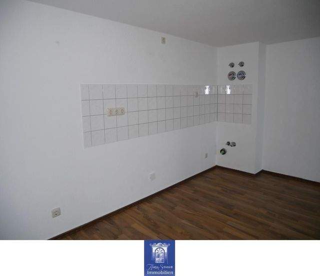 Individuelle und zentral gelegene Dachgeschoss-Wohnung mit offener Küche! - Foto 1