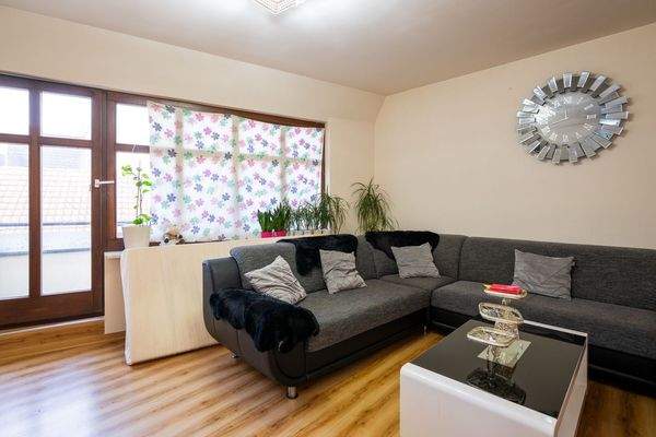 Wohnzimmer Fensterfront Balkon