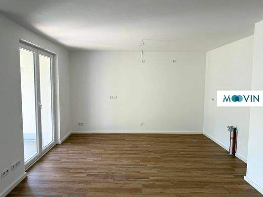 Ansicht III: Wohn- und Esszimmer mit offenem Küchenbereich