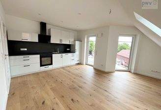 Wohnbereich mit Einbauküche