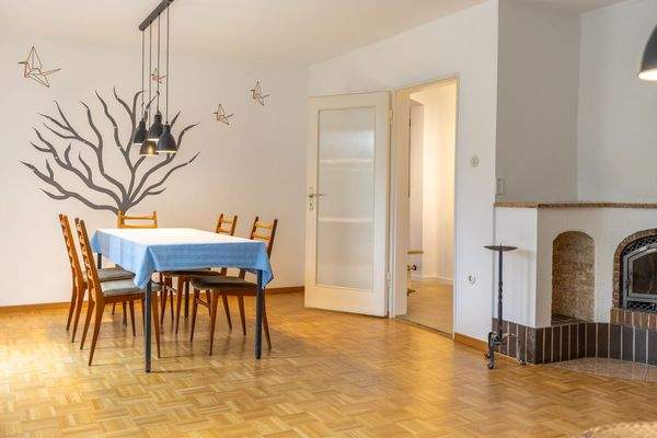 Familienidyll in Bogenhausen: Doppelhaushälfte mit sonnigem Westgarten & Grünblick