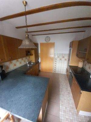 Küche mit Sitzmöglichkeiten