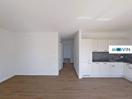 Ansicht VI: Wohn- und Esszimmer mit offenem Küchenbereich