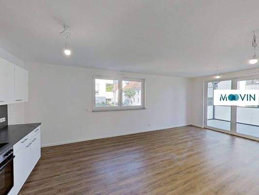 Ansicht I: Wohn- und Esszimmer mit offenem Küchenbereich