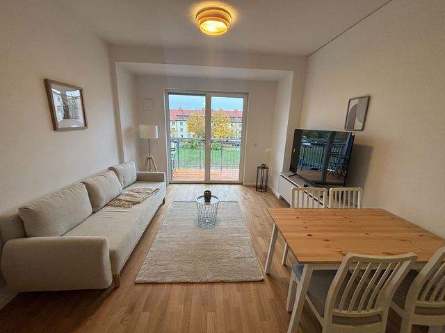 Erstbezug nach Sanierung - Vollmöblierte 2-Zimmer mit Parkett, Balkon, EBK, Fußbodenh. u. Belüftungsanlage - Photo 1