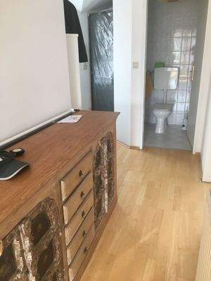 Entrance with toilet