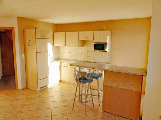 Wohnzimmer mit Küche