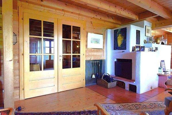 Zugang vom Flur mit offener Kamin