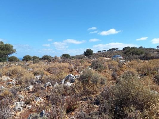 Kreta, Kokkino Chorio: Grundstück mit herrlichem Blick auf das Dorf zu verkaufen