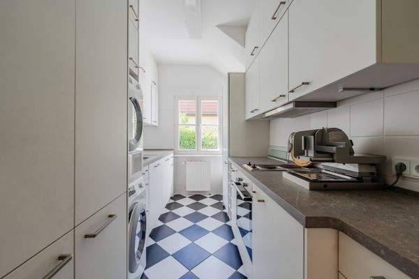 Utility room with additional fitted kitchen