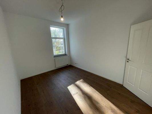 #9 Wohnung Hofseite 1.OG Schlafen.jpg