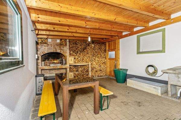 Überdachte Terrasse, Kaminofen