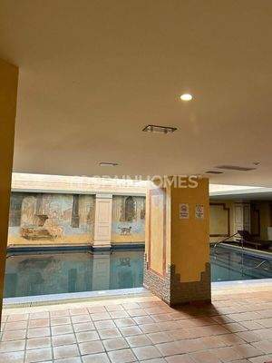 Beachfront Apartment with Community Pool and Parking in Estepona