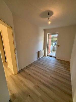 Gästezimmer mit Zugang zum kleinen Balkon