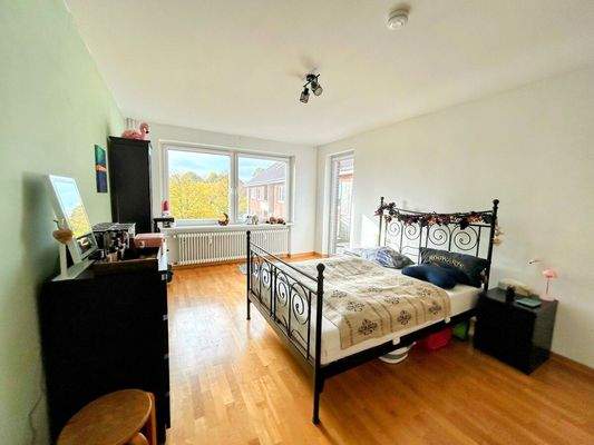 Schlafzimmer mit Balkonzugang