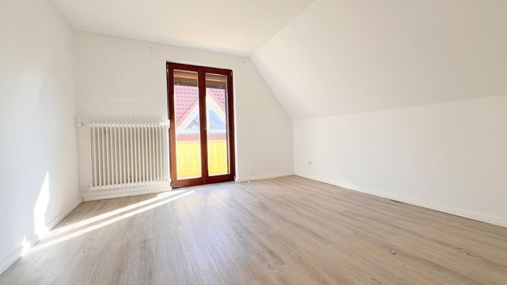 Schlafzimmer mit Balkonzugang