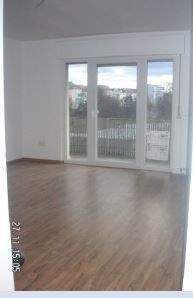 Wohnzimmer mit Balkon