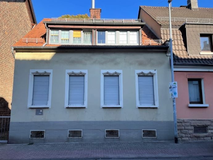 Einfamilienhaus mit Garten und Baugrundstück in St.Ingbert