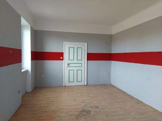 Eines der Zimmer im OG