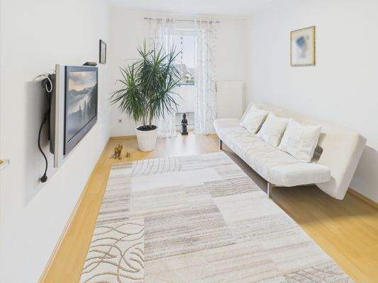 Schlafzimmer mit Zugang zum Balkon