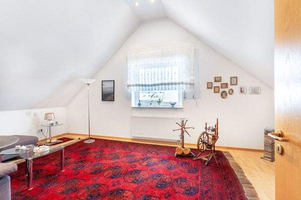 Schlaf- / Arbeitszimmer im Spitzboden