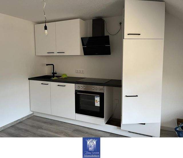 Individuelle Wohnung mit EBK im Dachgeschoss! - Photo 1