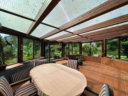 Wintergarten mit Sitzbereich