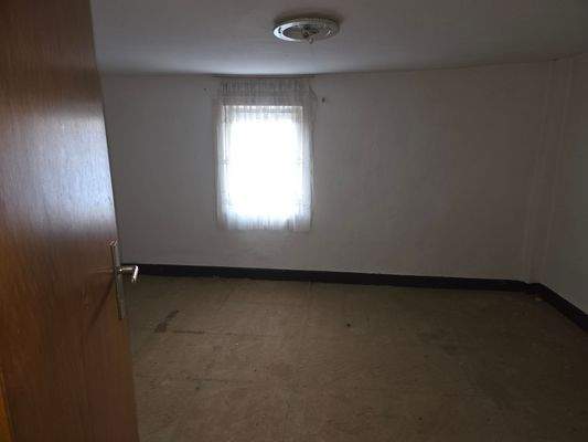 Schlafzimmer Nebenhaus im 1 Stock.jpg