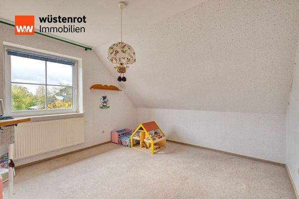 Schlafzimmer - Obergeschoss (Kind 1)