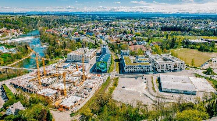 Urbanes Leben mit Alpenblick