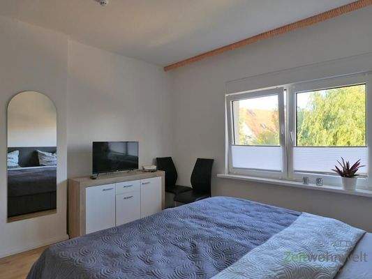 TV im hinteren Schlafzimmer