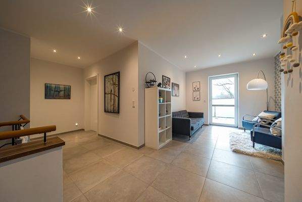 Flur mit Sitzbereich im Obergeschoss