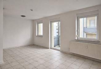 Wohnbereich mit offener Küche.png