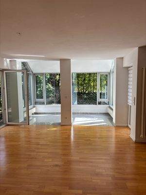 Wohnzimmer mit Wintergarten