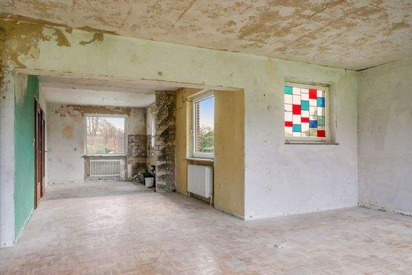 Wohnzimmer mit Essbereich und Küche